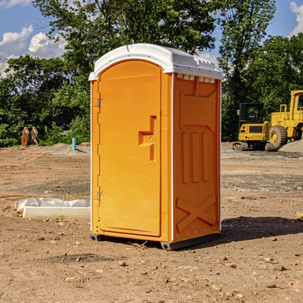 how often are the portable restrooms cleaned and serviced during a rental period in Walcott IA